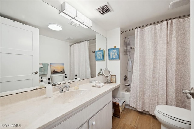 full bathroom with toilet, vanity, shower / bath combo, and hardwood / wood-style flooring