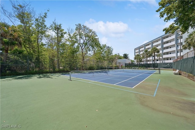 view of tennis court with basketball court