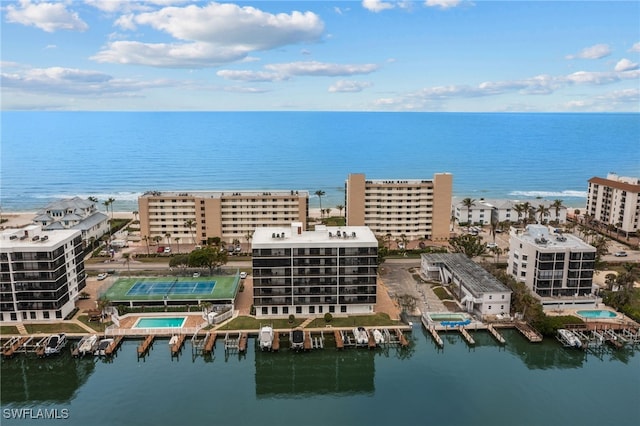 birds eye view of property featuring a water view