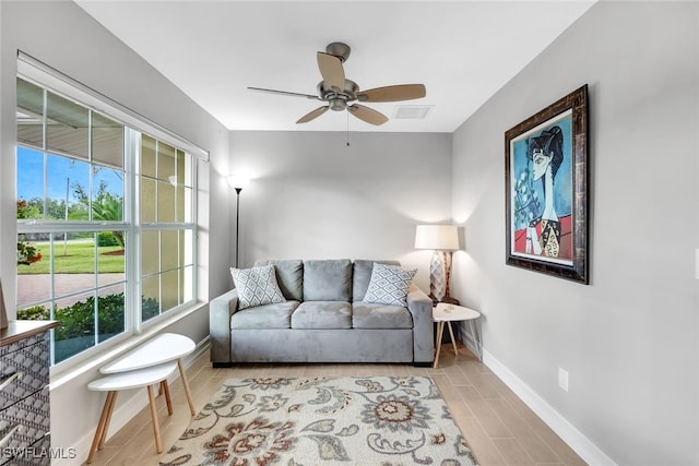 living room featuring ceiling fan