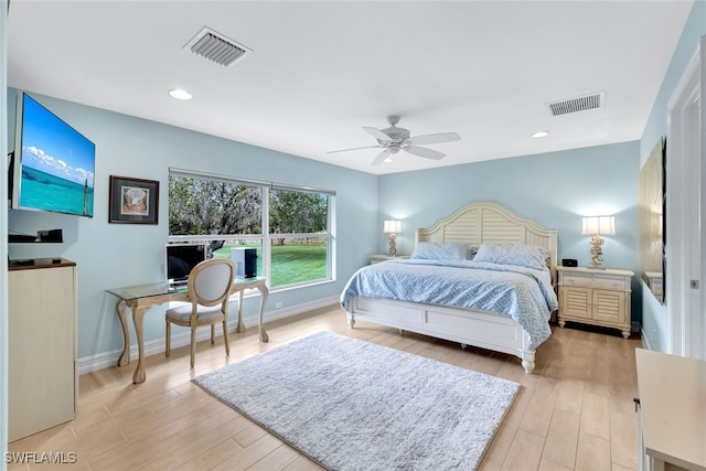 bedroom featuring ceiling fan and light hardwood / wood-style floors