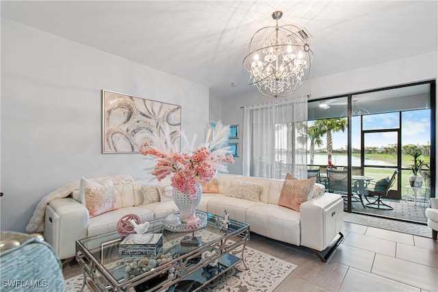 tiled living room with an inviting chandelier