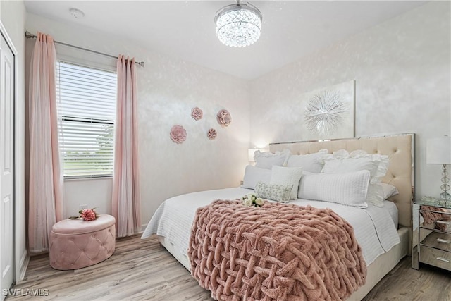 bedroom with light hardwood / wood-style floors