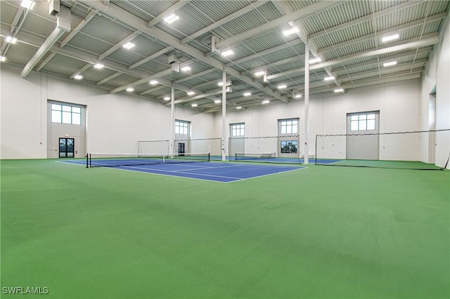 view of tennis court featuring basketball court