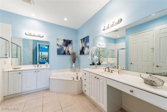 bathroom with independent shower and bath, ceiling fan, tile patterned floors, and vanity