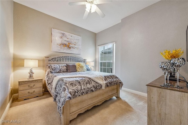 9275 Museo Cir Unit 103, Naples, FL 34114 - bedroom featuring baseboards, a ceiling fan, and light carpet