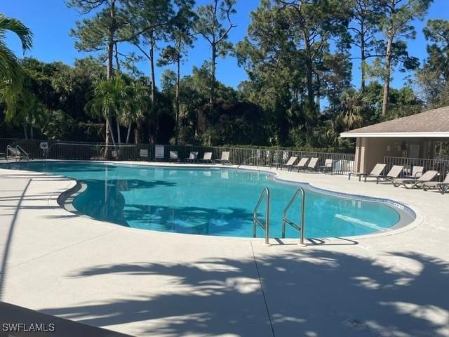 view of swimming pool featuring a patio