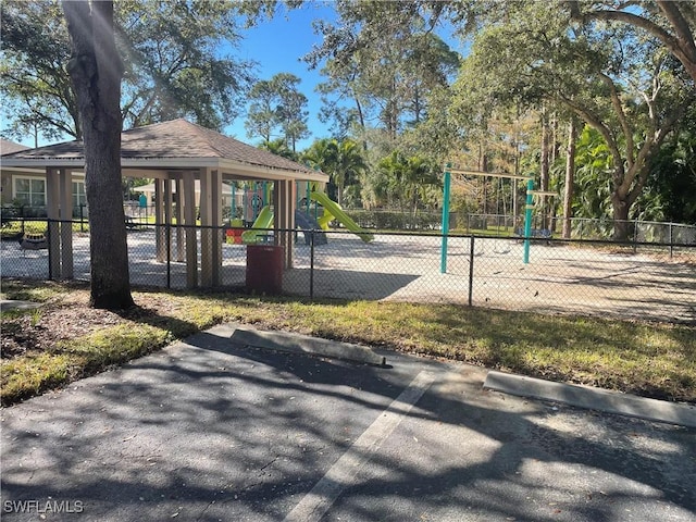 view of property's community with a playground