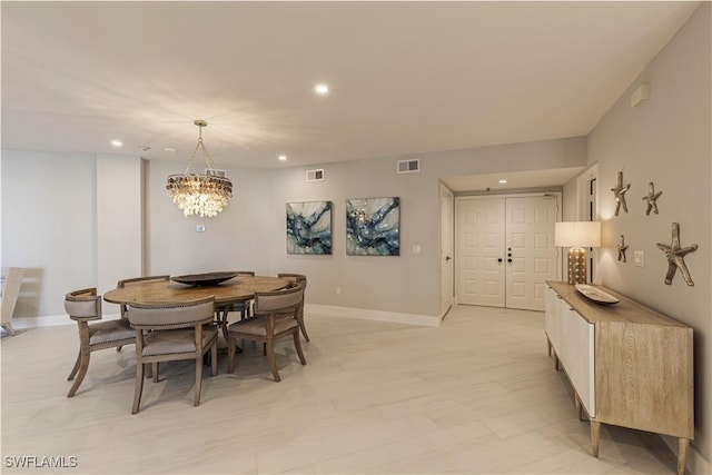 dining room featuring a chandelier, recessed lighting, visible vents, and baseboards