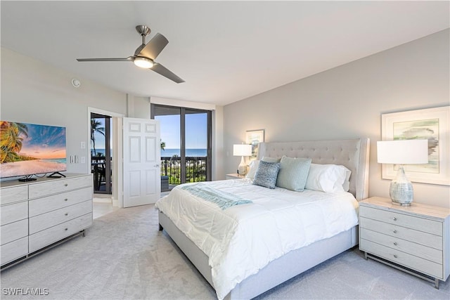 bedroom with access to exterior, light colored carpet, ceiling fan, and lofted ceiling