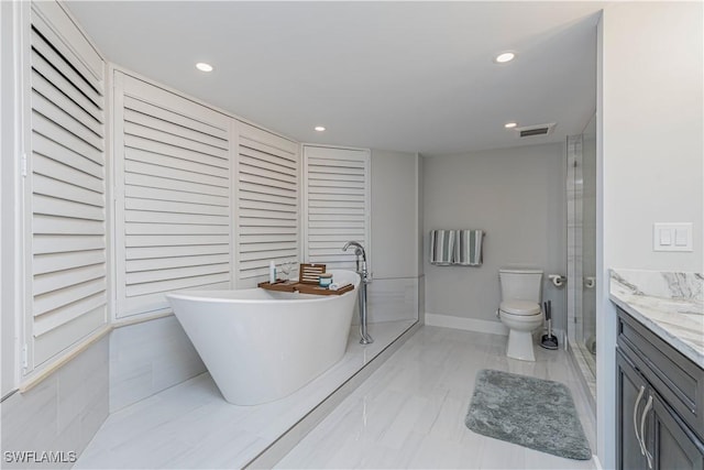 bathroom with recessed lighting, a soaking tub, visible vents, toilet, and vanity