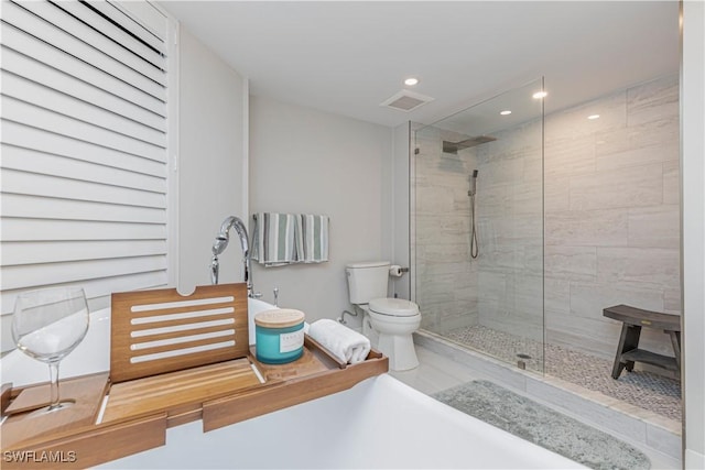 bathroom with toilet, visible vents, walk in shower, and recessed lighting