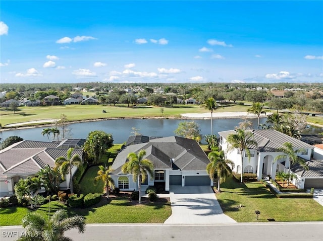 bird's eye view with a water view