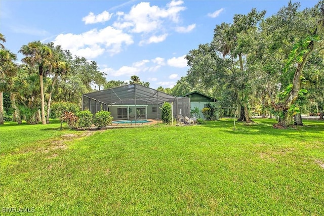 view of yard with a lanai