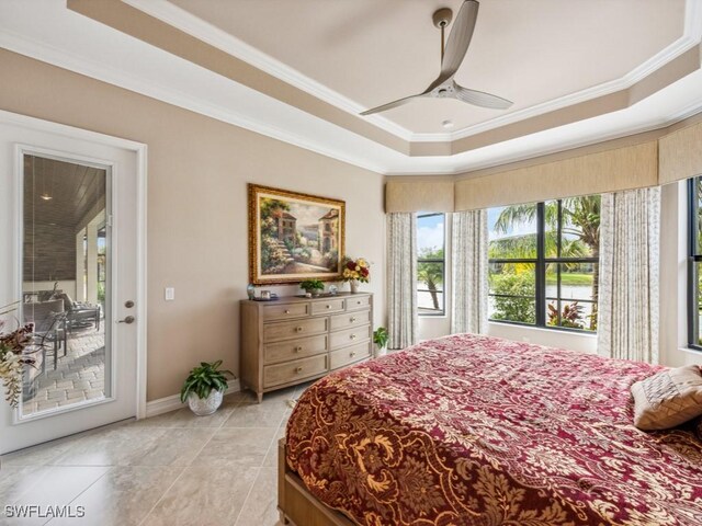 bedroom with ornamental molding, access to outside, light tile patterned floors, ceiling fan, and a raised ceiling