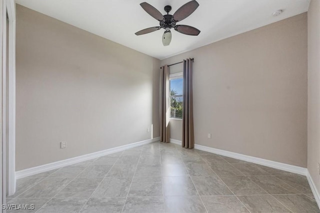 spare room featuring ceiling fan