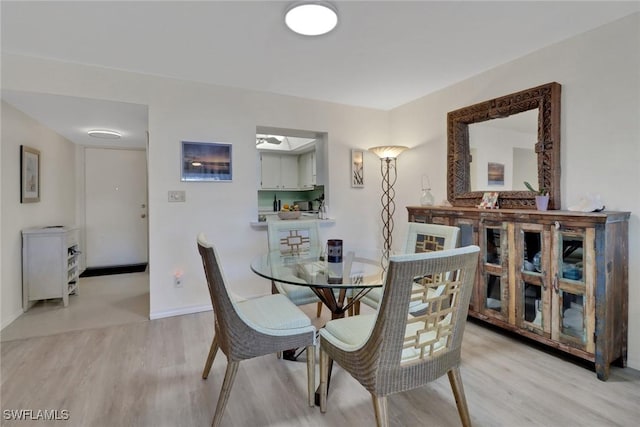 dining area featuring light hardwood / wood-style floors