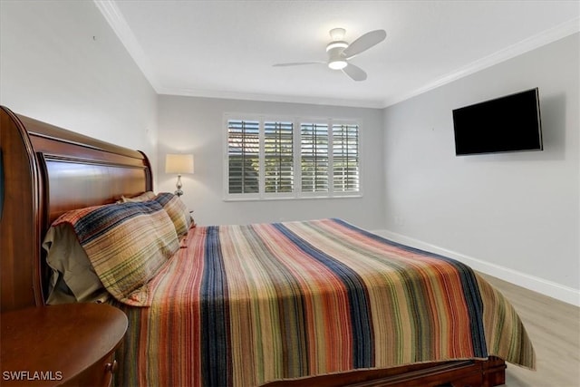 bedroom with wood-type flooring, ceiling fan, and ornamental molding