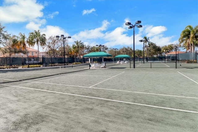 view of sport court with fence