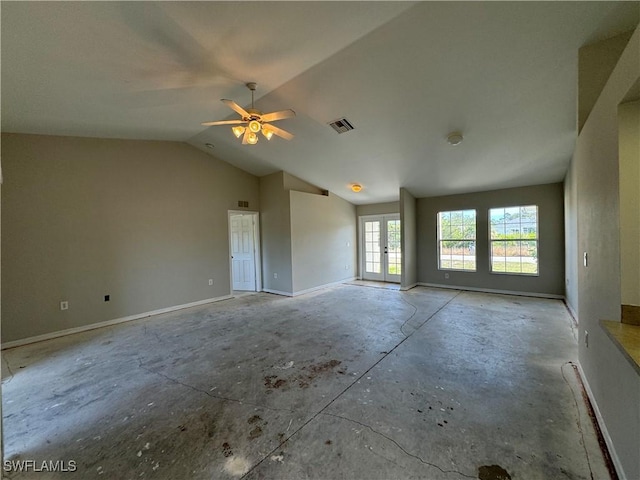 unfurnished room featuring ceiling fan, french doors, and vaulted ceiling