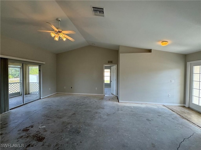 unfurnished room with ceiling fan, a healthy amount of sunlight, and vaulted ceiling