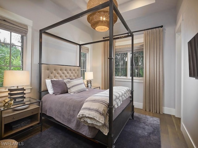 bedroom featuring wood-type flooring