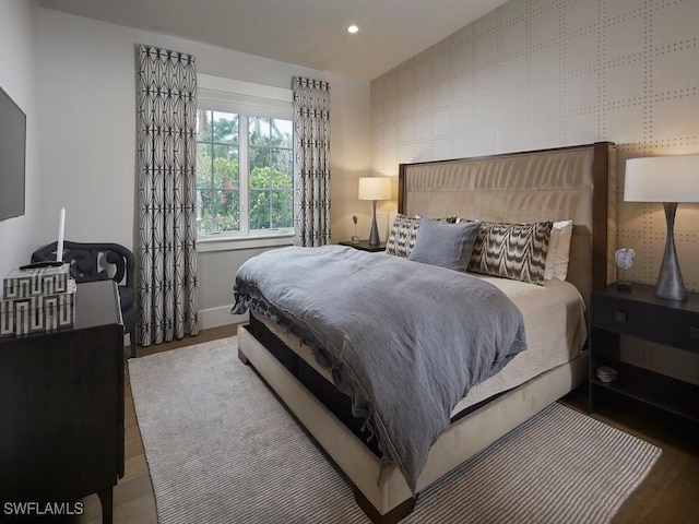 bedroom featuring hardwood / wood-style floors