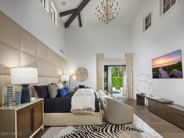 bedroom with a high ceiling, a chandelier, dark hardwood / wood-style flooring, and beamed ceiling