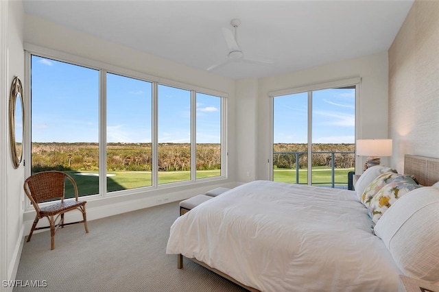 bedroom with ceiling fan and carpet floors