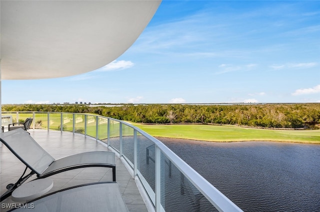 balcony featuring a water view