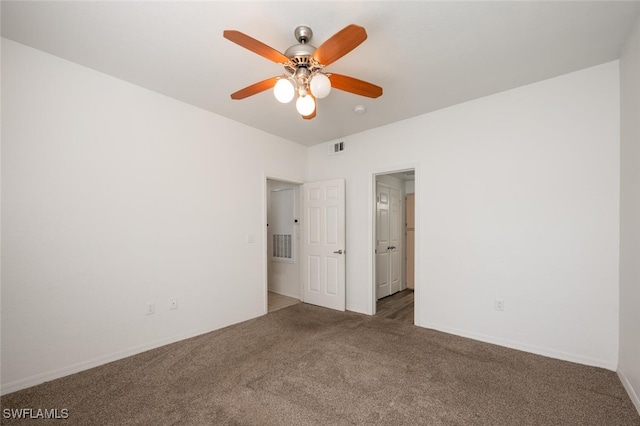 carpeted empty room with ceiling fan