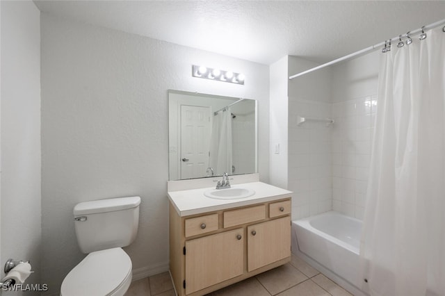 full bathroom with tile patterned floors, vanity, shower / bath combo, and toilet