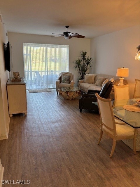 living room featuring hardwood / wood-style floors, plenty of natural light, and ceiling fan