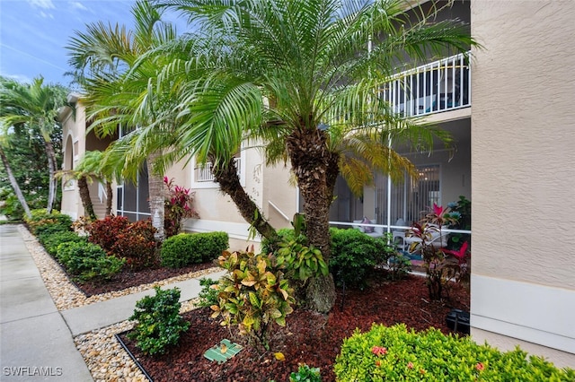 view of property exterior featuring a balcony