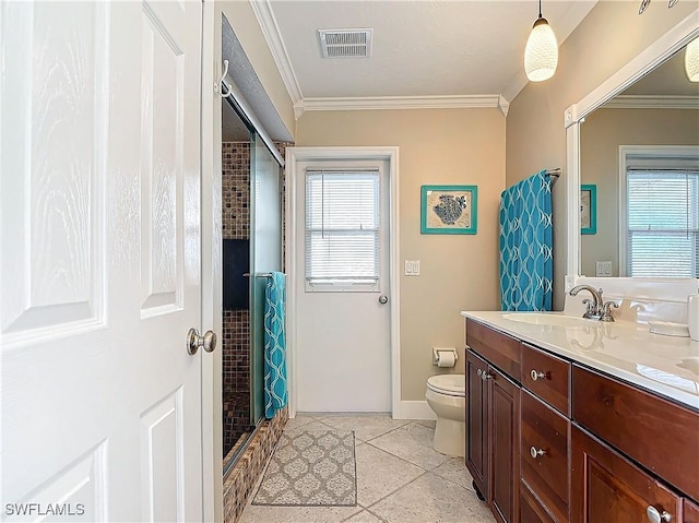 bathroom featuring tile patterned floors, ornamental molding, vanity, a shower, and toilet