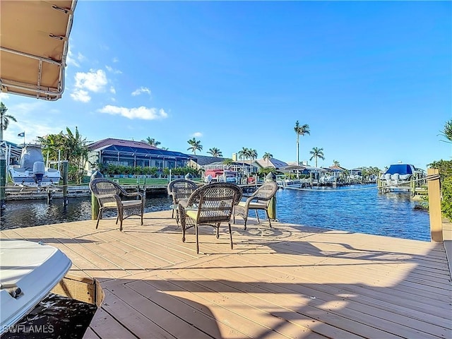 dock area featuring a water view