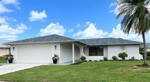 ranch-style home with a garage and a front yard