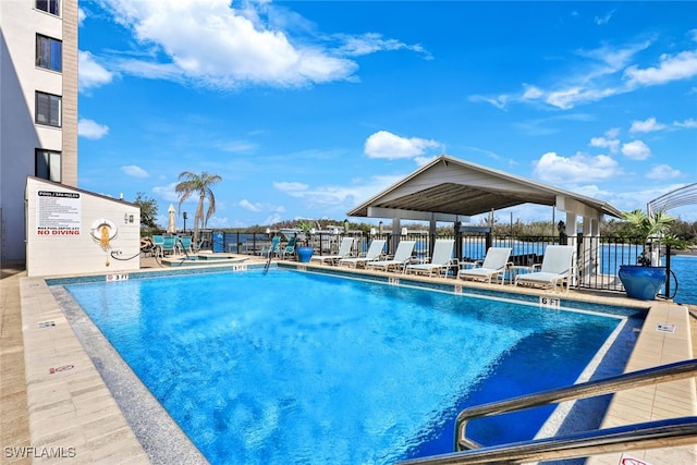 view of swimming pool with a patio area