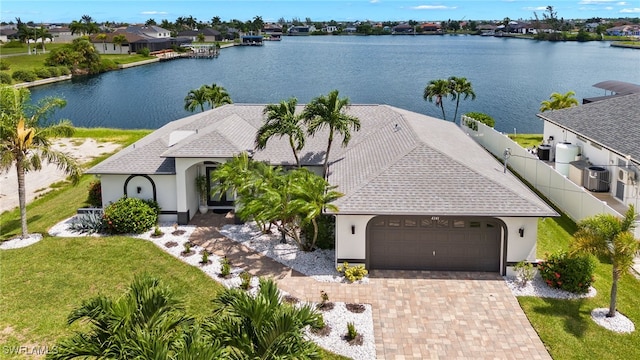 drone / aerial view with a water view