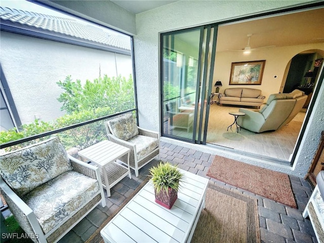 sunroom with plenty of natural light