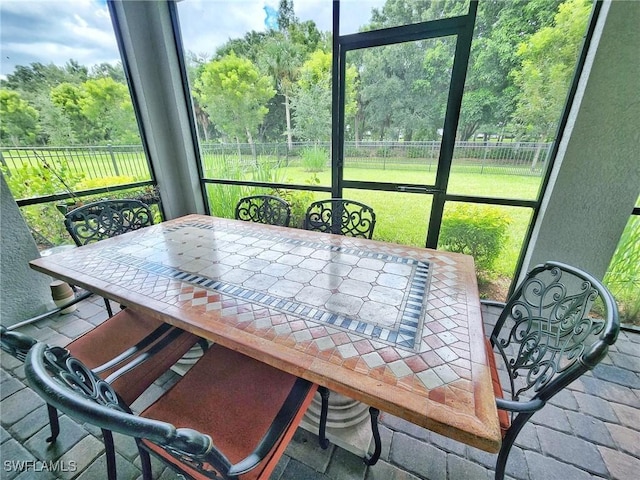 sunroom featuring plenty of natural light