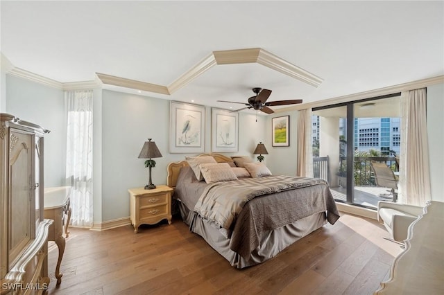 bedroom with ceiling fan, access to exterior, light wood-type flooring, and ornamental molding