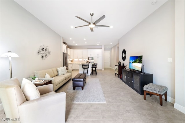 living room featuring ceiling fan