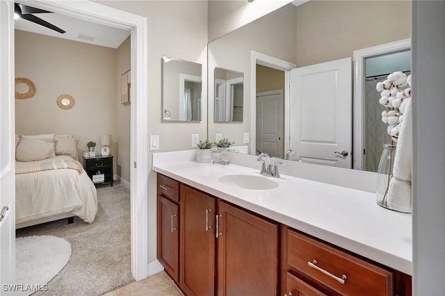 bathroom with ceiling fan and vanity