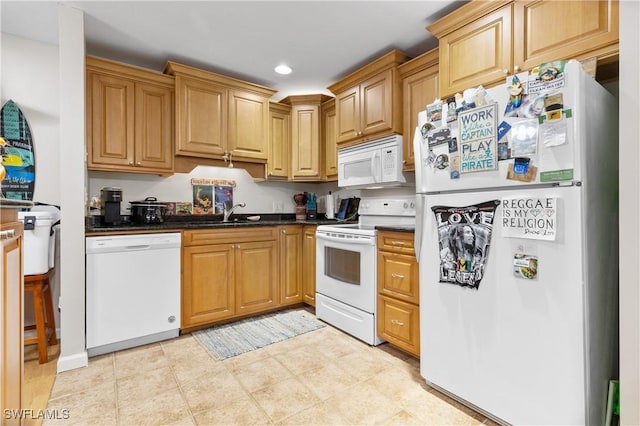 kitchen with white appliances and sink