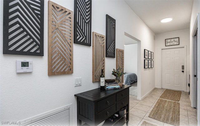 interior space with light tile patterned floors