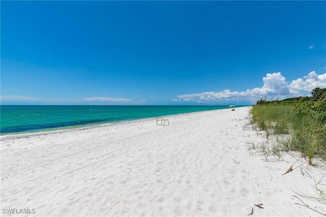 property view of water featuring a view of the beach