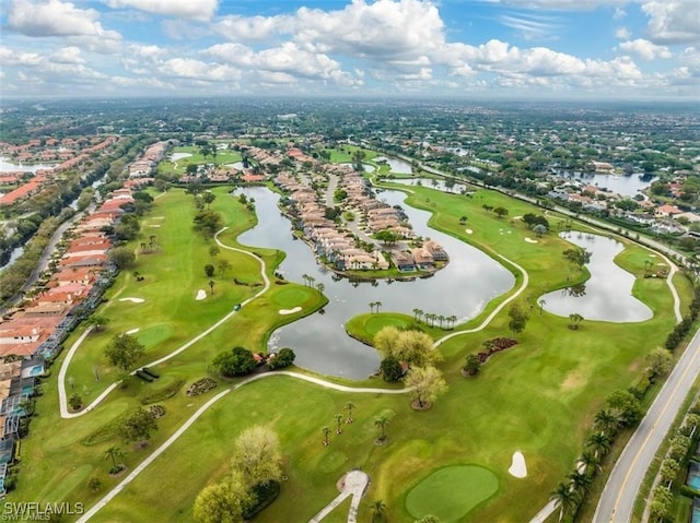 aerial view with a water view and golf course view