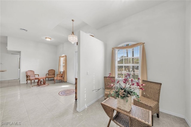 living area featuring light tile patterned floors