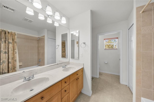 full bathroom with toilet, vanity, tile patterned floors, and shower / bath combo with shower curtain